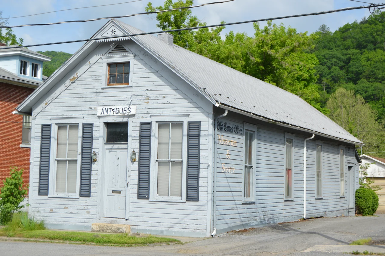 Front and northeastern side of the former print shop for the Pocahontas Times (now an antiques shop and museum), located at 810 Second Avenue in Marlinton, West Virginia, United States. Built in 1900, it is listed on the National Register of Historic Places.