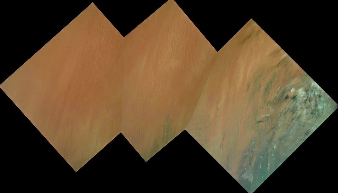 Oblique view of part of the ergs of the El Djouf region of the Sahara Desert in Mauritania and Mali, Africa. Mosaic of Apollo 9 photographs from orbit.