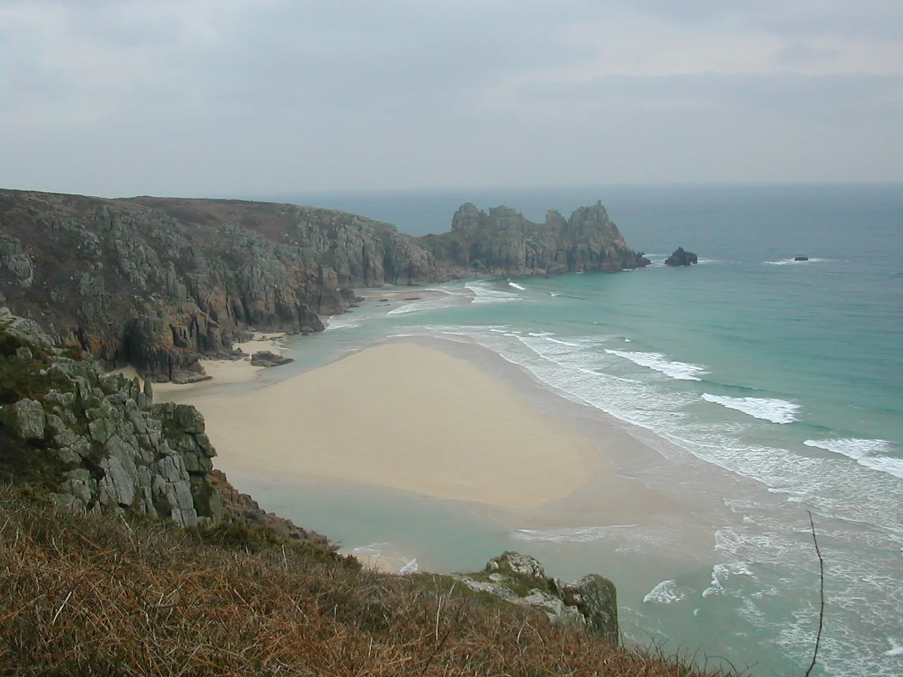 Treen beach, with the Logan Rock headland in the background, near Porthcurno, Cornwall, United Kingdom
Author Chris Ango
March 2006