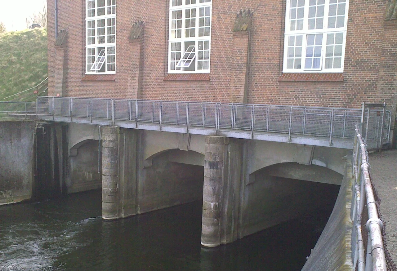 Water flow under machinery hall of the largest hydroelectric power plant in Denmark, Tangeværket. Also part of The Danish Museum of Electricity.